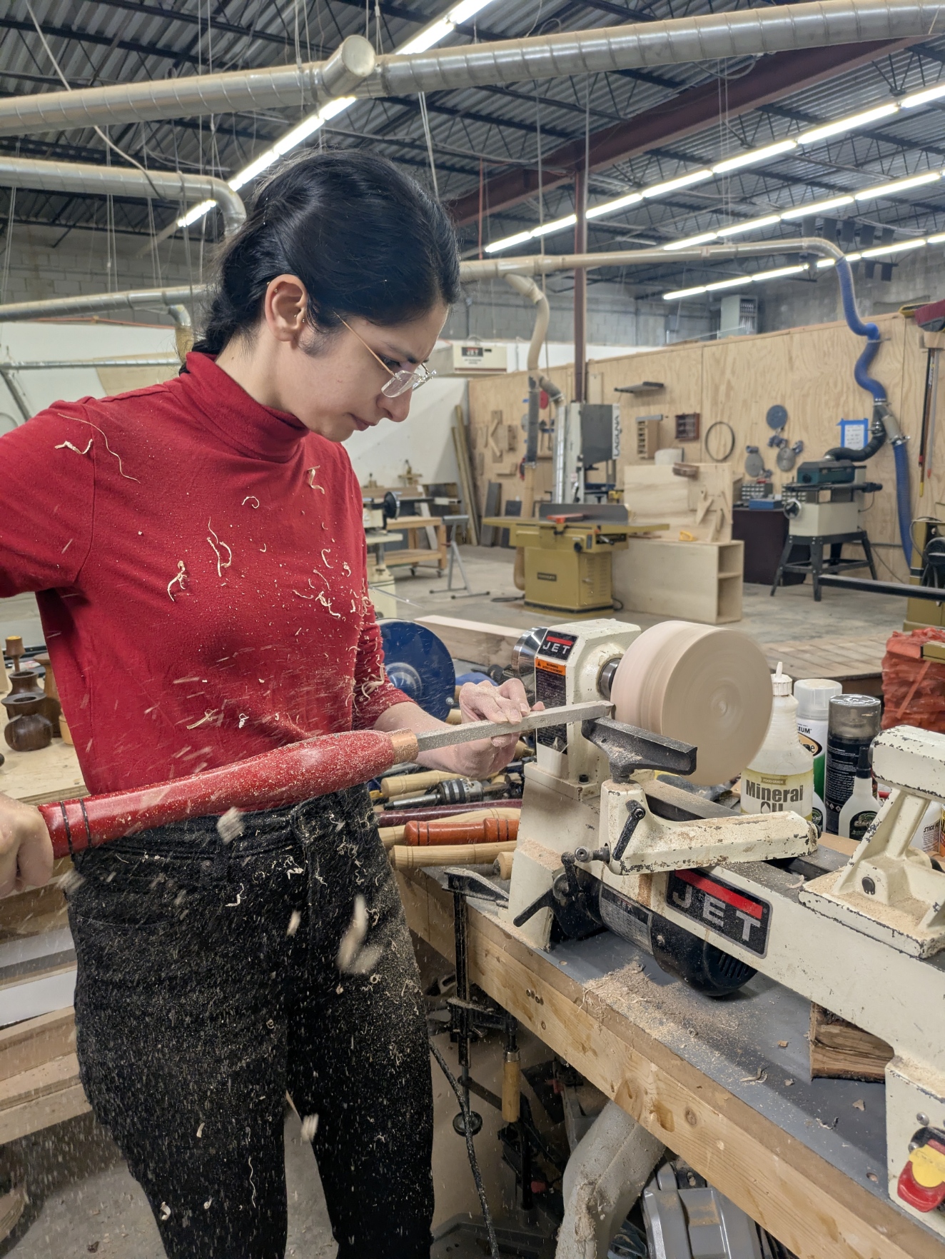 Student learning to turn a bowl.